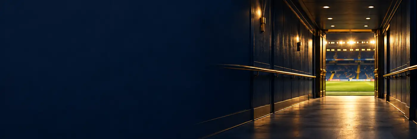 A stadium tunnel opening onto a floodlit pitch (AI-generated image)